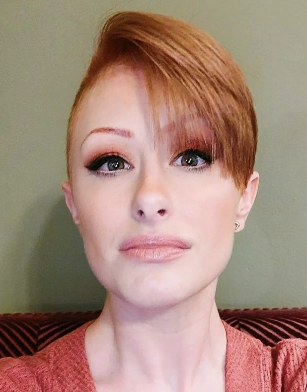 Copper Pixie Cut with Asymmetrical Bangs and Undercut