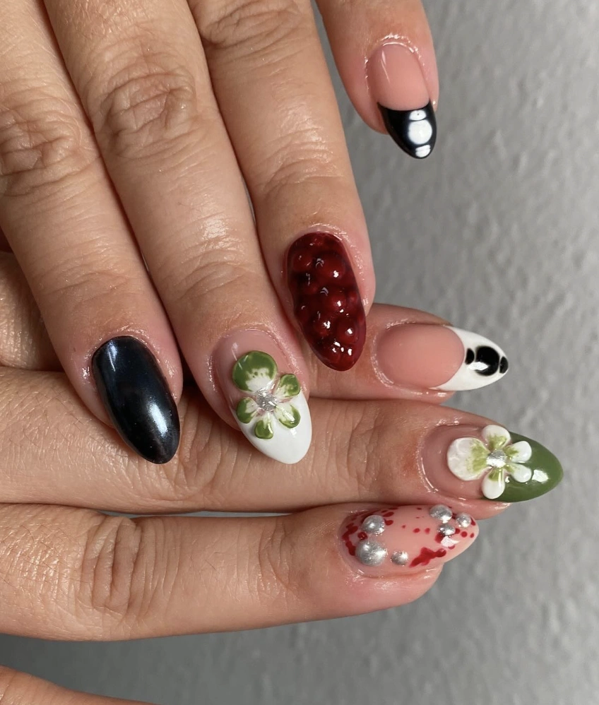 Creative Fall Nails Gel with Floral Designs, Deep Reds, and Glossy Accents