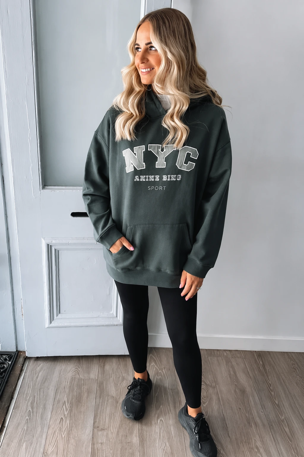 Dark Green Graphic Hoodie + Black Leggings + Black Sneakers