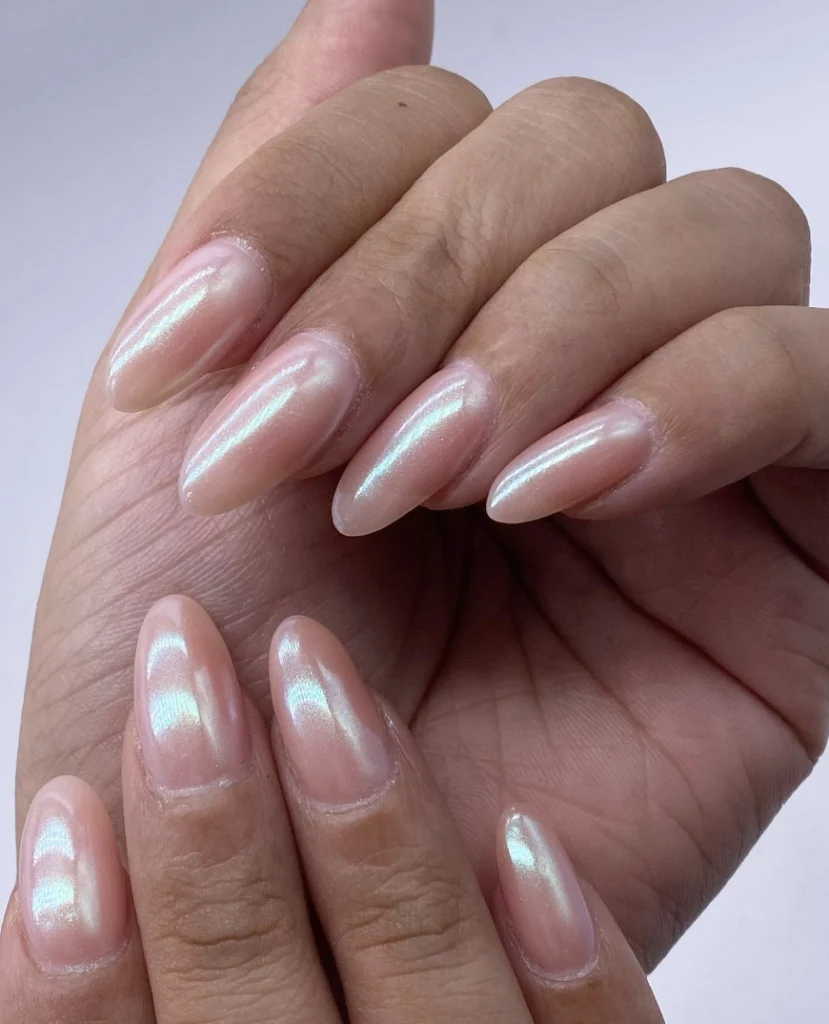 Delicate Almond Fall Chrome Nails with Iridescent Hues and Subtle Sheen