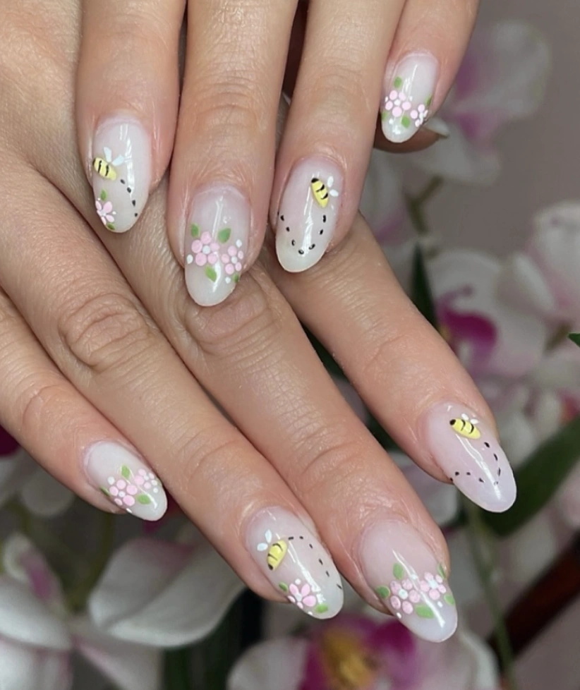 Delicate Almond Nails with Bee and Blossom Design