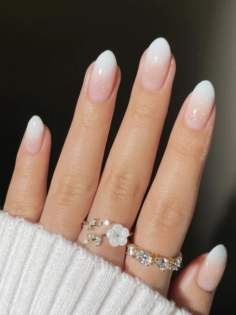 Delicate White Ombre Almond Nails