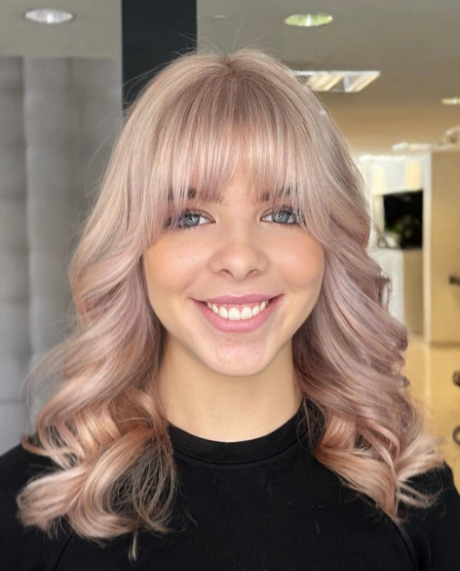 Dimensional Rose Copper with Full Bangs and Soft Waves