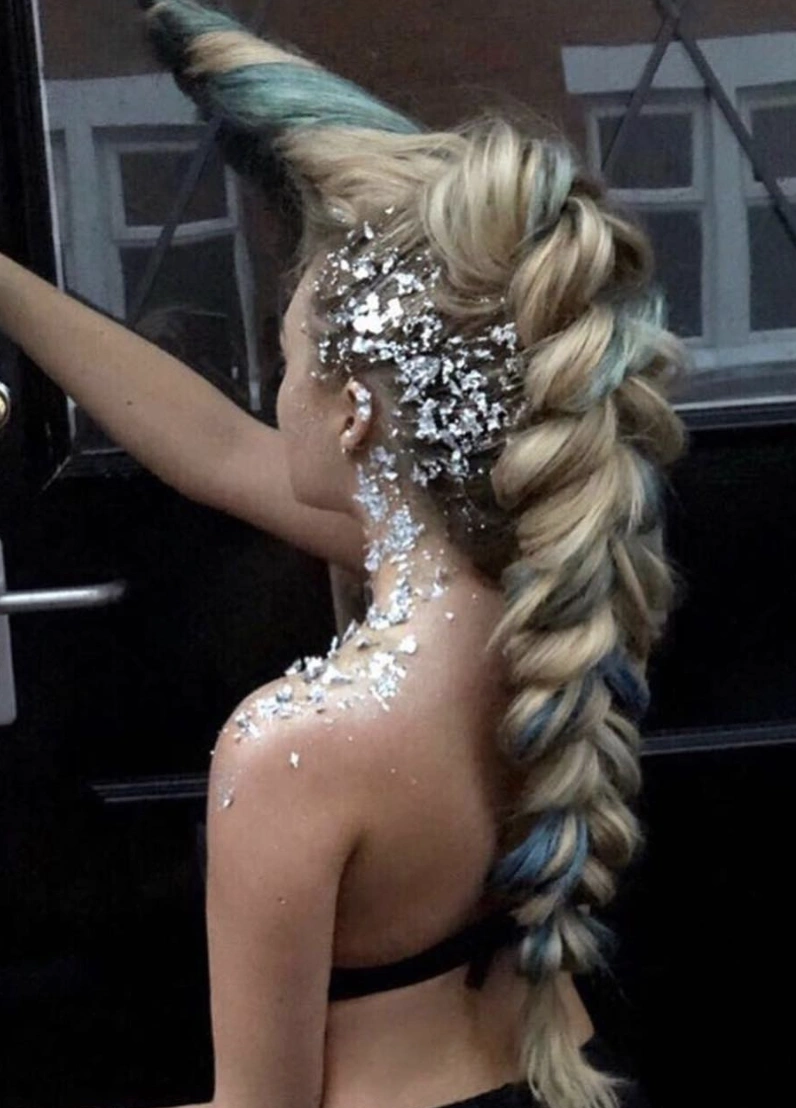 Dramatic Long Braided Mohawk with Glitter Accents and Teal Highlights