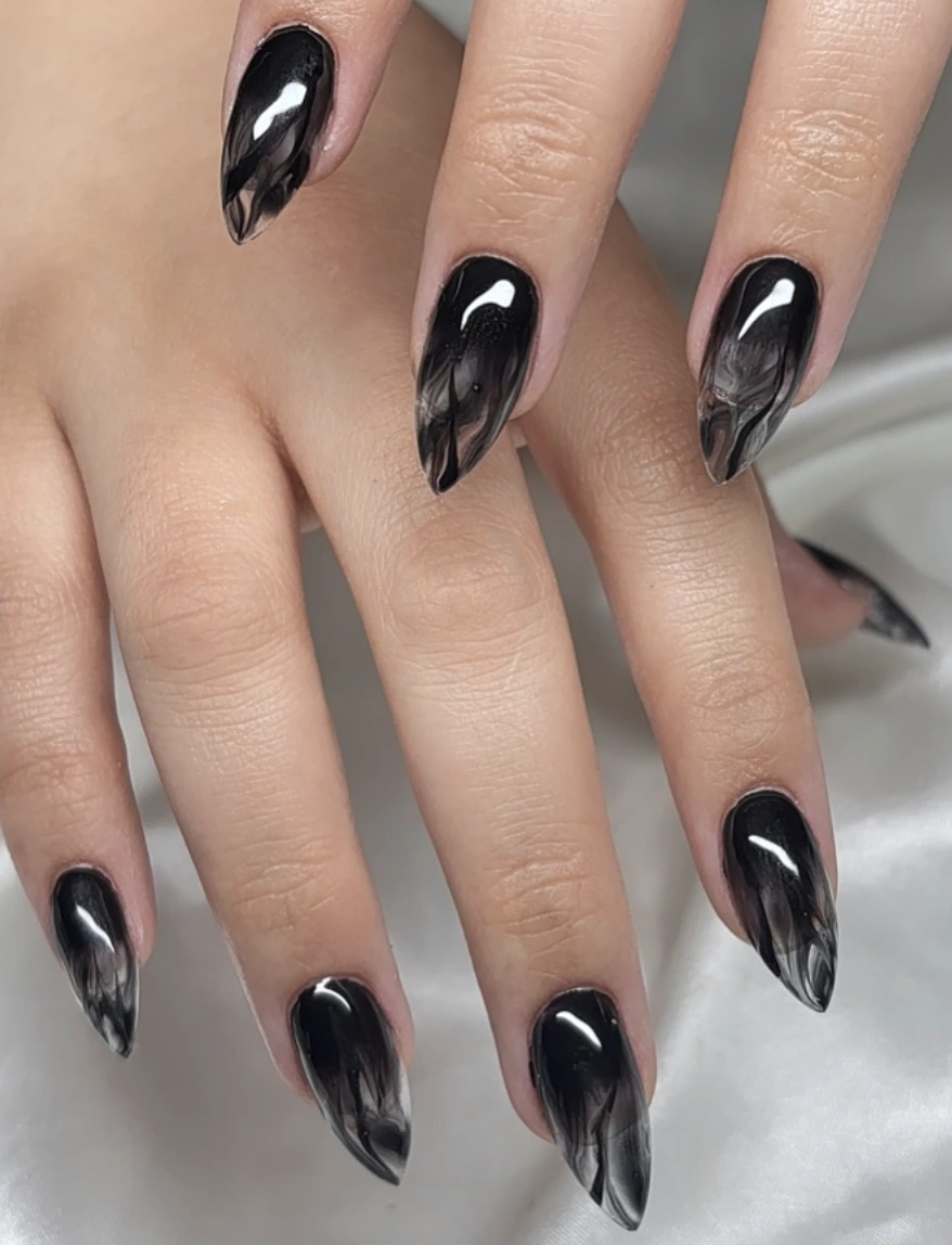 Dramatic Smoke Effect on Stiletto Black and White Nails