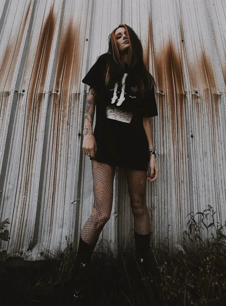 Edgy Chic: Oversized Tee + Fishnet Tights