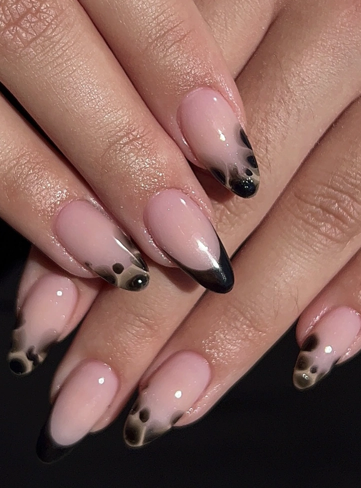 Elegant Almond Fall Nails with Black Tips and Abstract Brown Accents