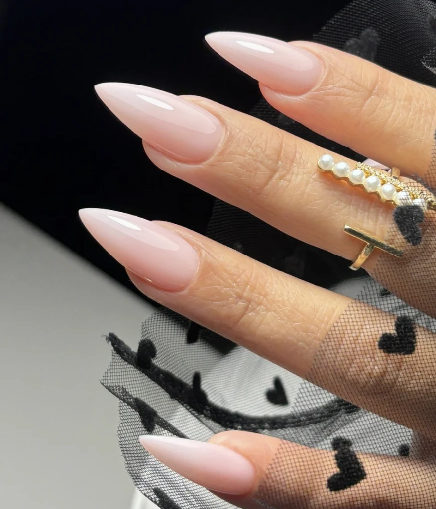 Elegant Almond-Shaped Nails in Milky White with a Glossy Finish