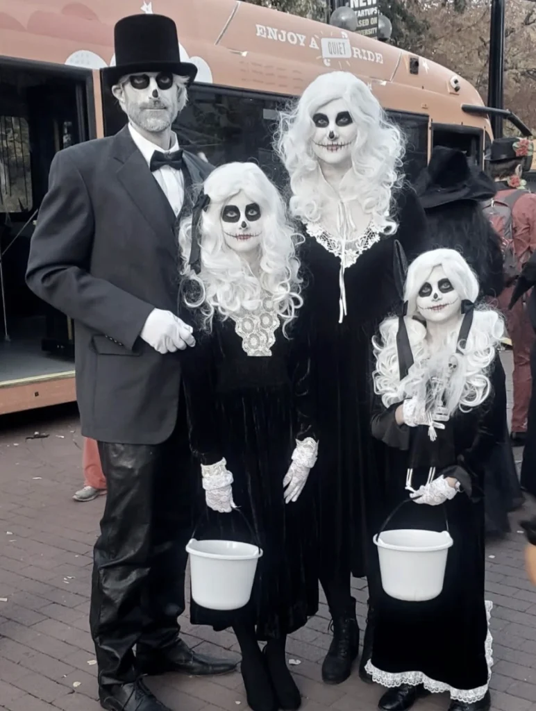 Elegant Skeleton Family Costumes + Black Velvet Dresses + White Lace Gloves + Vintage Top Hat + Spooky Skull Makeup