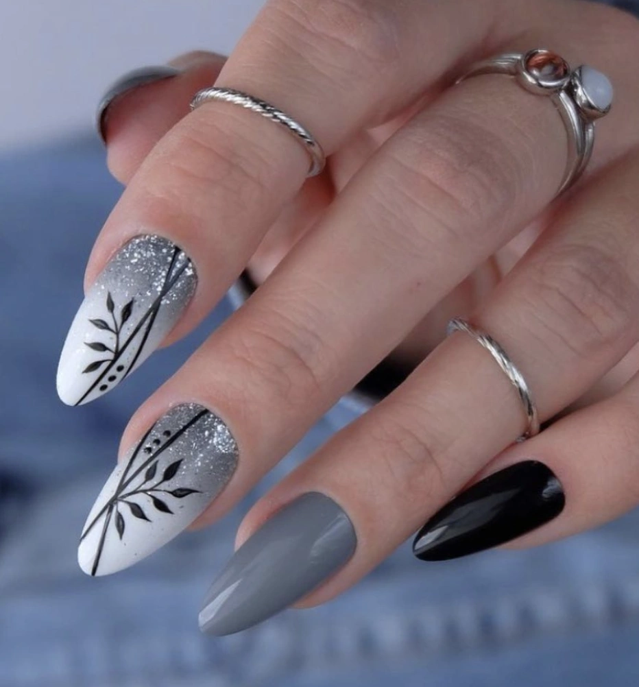 Elegant Stiletto Fall Gel Nails Designs with Silver Glitter and Leaf Patterns