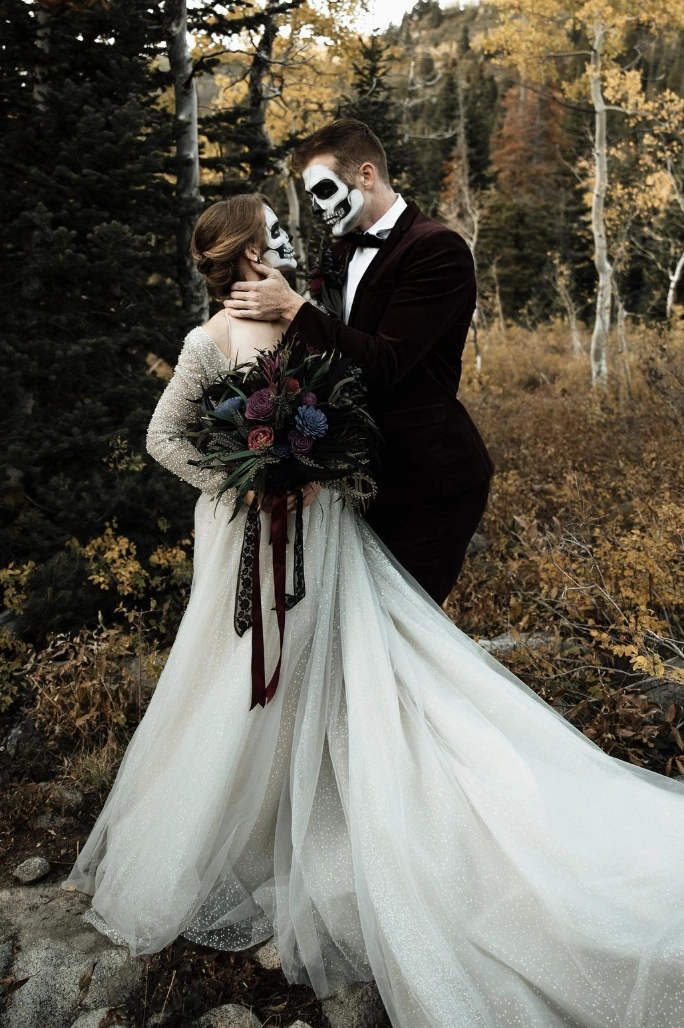 Elegant White Gown + Dark Velvet Suit + Colorful Floral Bouquet + Halloween Couple Makeup