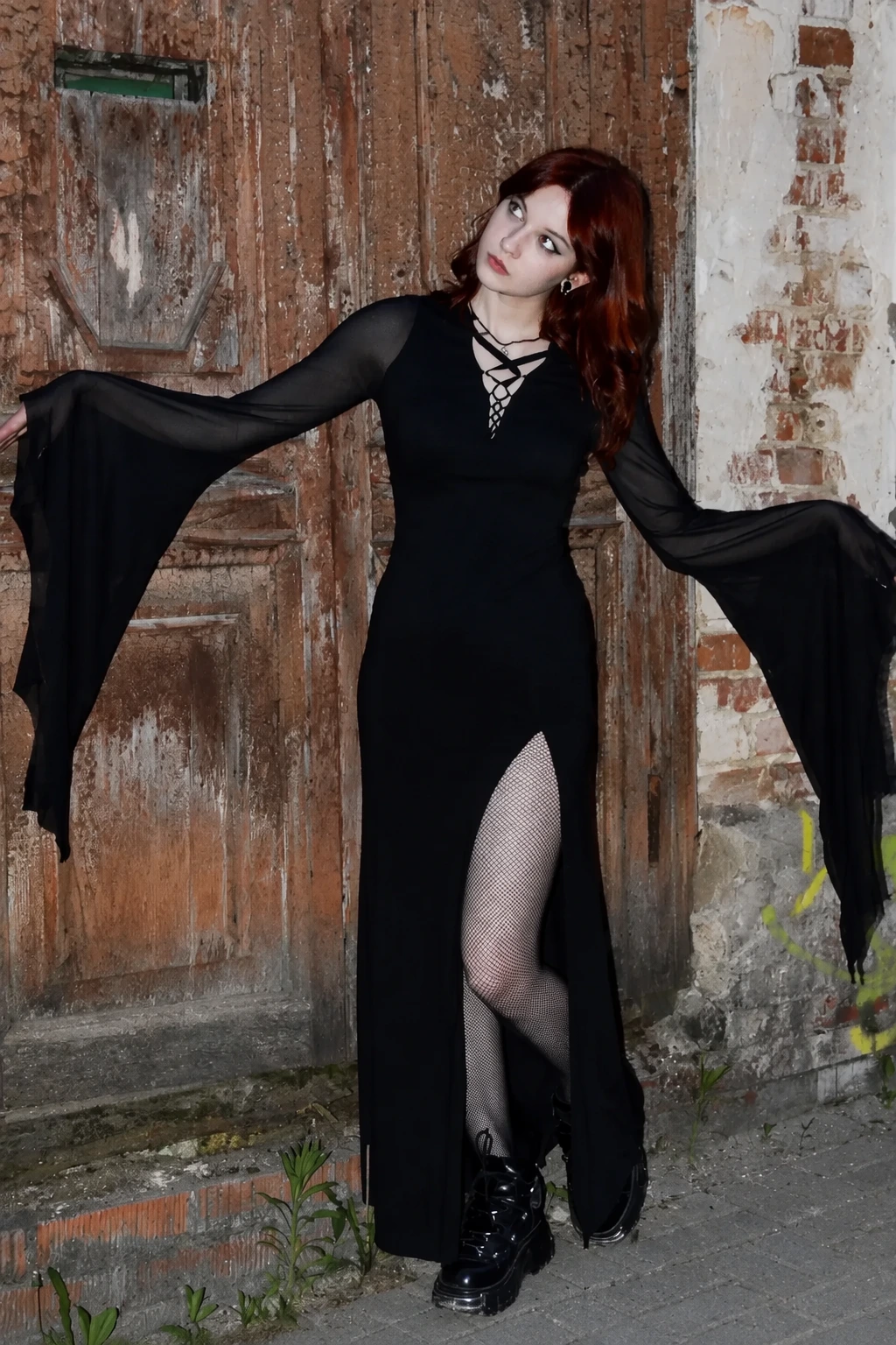 Elegantly Dark Bell-Sleeve Gown