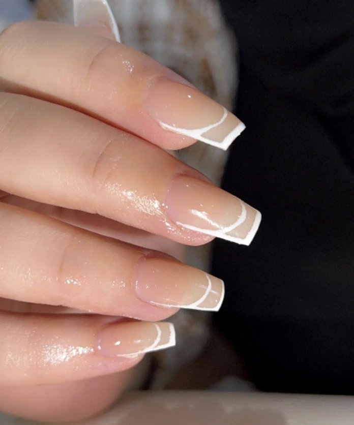 Geometric White Design on Square Elegant Nude Nails