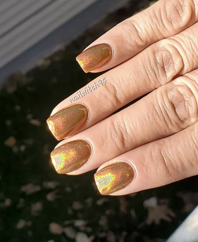 Glistening Brown Chrome Coffin Nails with Holographic Shimmer