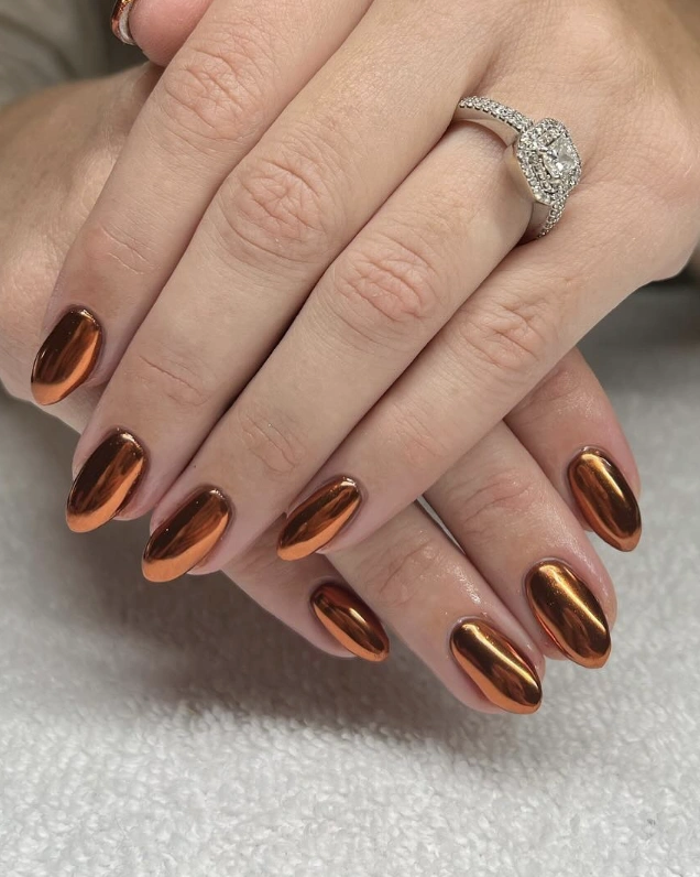 Glistening Copper Oval Nails with a High-Shine Finish