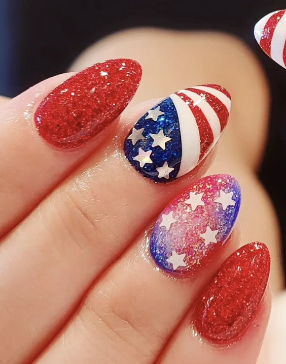 Glittery Red and Blue Almond July 4th Nails with Star and Stripe Accents