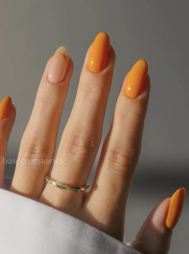 Glossy Mango Almond Nails with Gilded Accent Nail