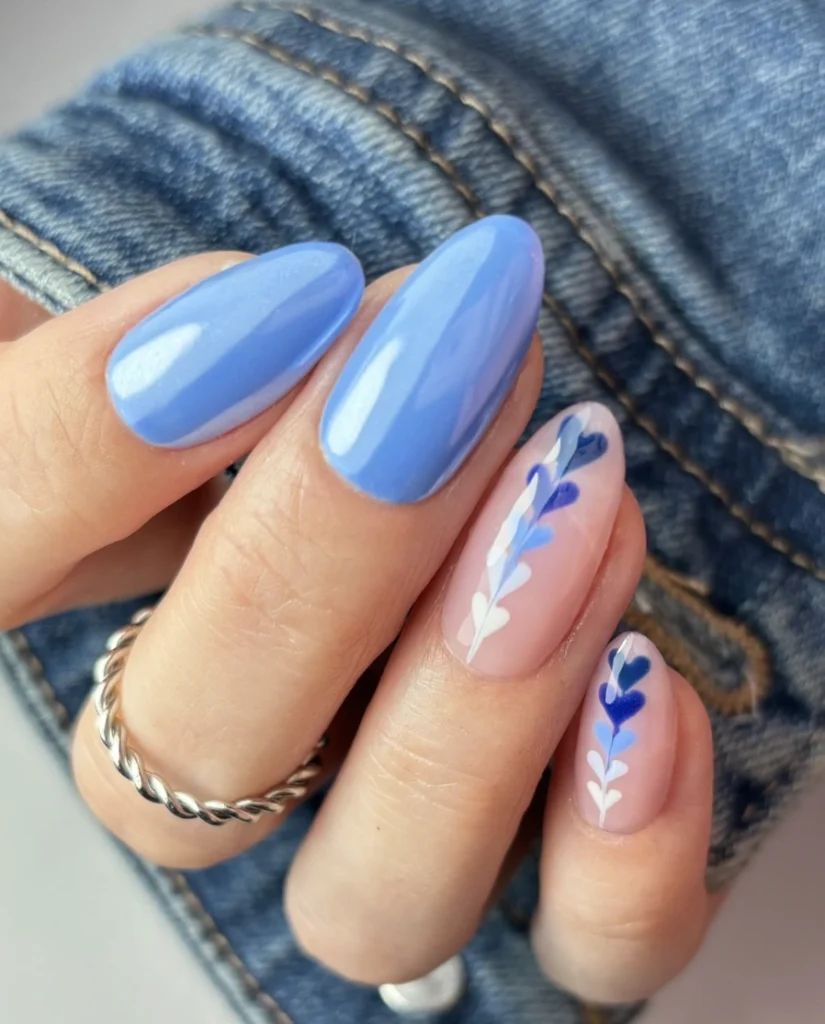 Glossy Periwinkle Almond Nails with Floral Accent