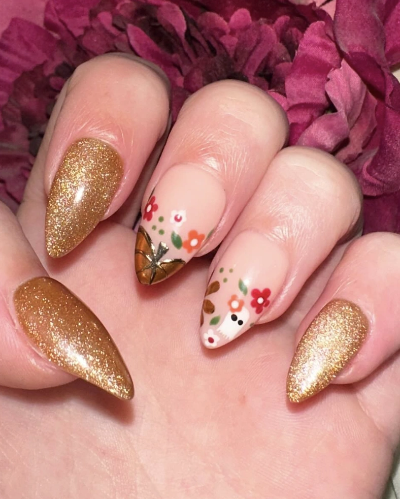 Gold Stiletto Nails with Whimsical Autumn Floral Designs
