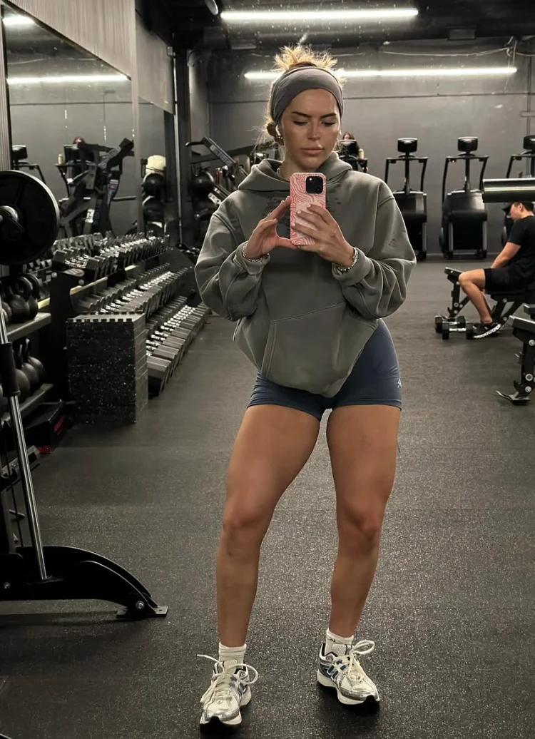 Gray Oversized Hoodie + Blue Bike Shorts + White Athletic Sneakers + Gray Headband