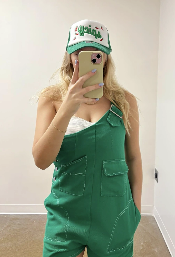 Green Denim Overalls + White Crop Top + Green “Spicy” Cap for St Patrick Day Outfit