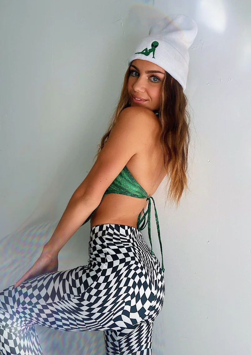 Green Halter Top + Black White Checkered Leggings + White Knit Beanie