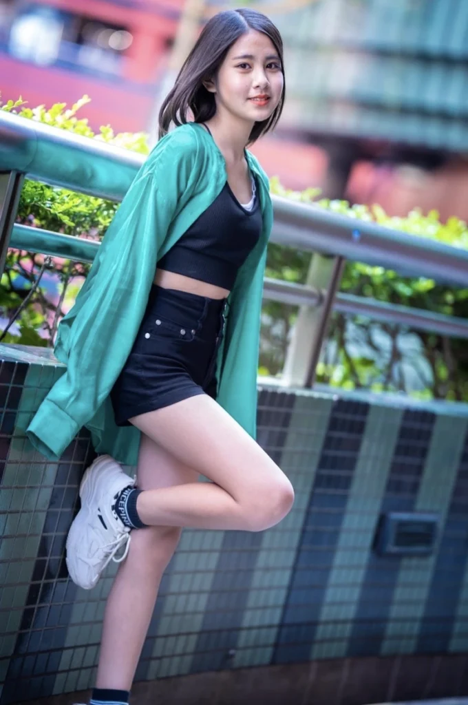 Green Overshirt + Black Crop Top + Black High-Waisted Shorts + White Sneakers