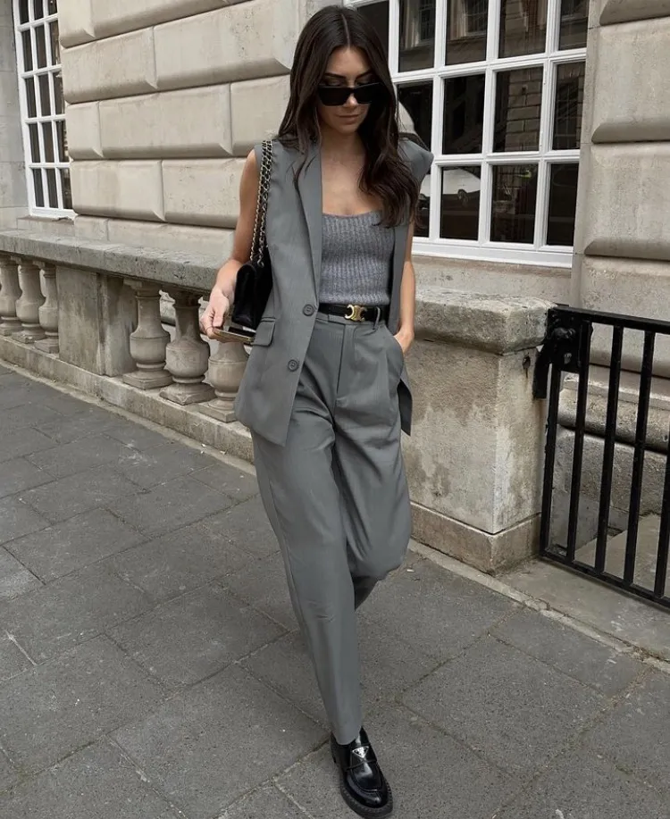 Grey Sleeveless Blazer Vest + Grey High-Waisted Pleated Trousers + Grey Ribbed Knit Tank Top + Black Chunky Loafers