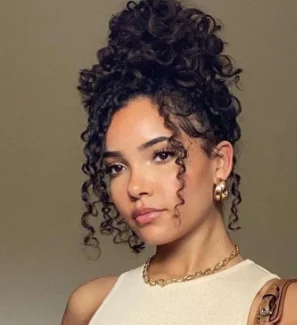 High Bun with Loose Curls