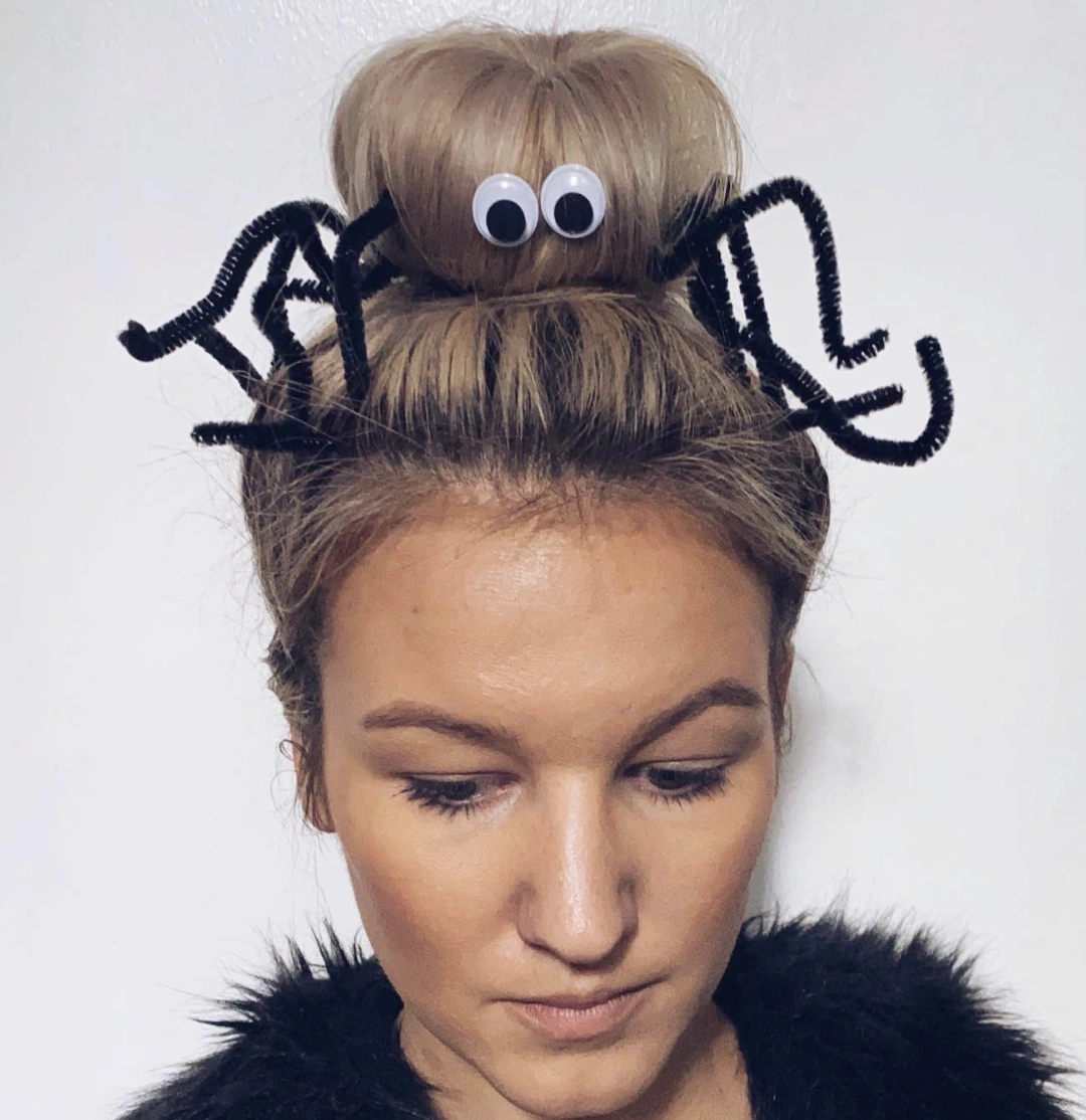 High Bun with Playful Spider Accents