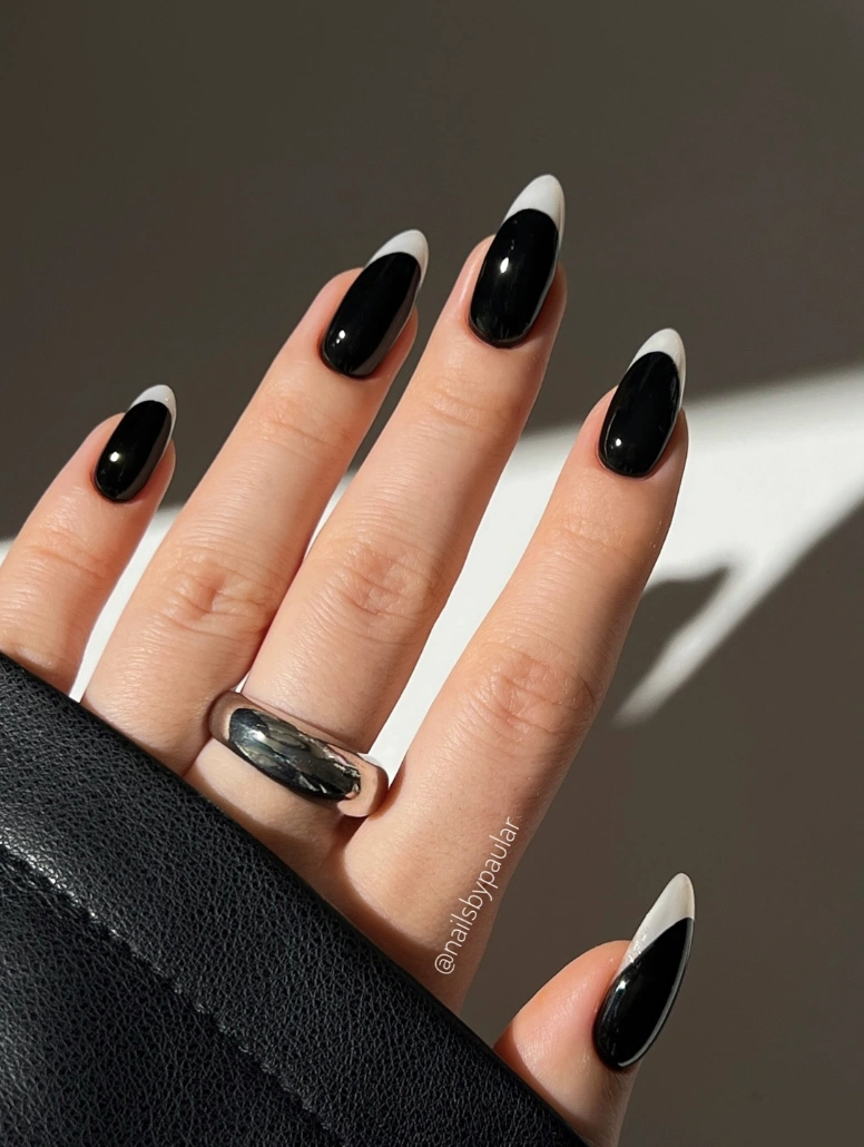 High-Gloss Black Almond Nails with Classic White Tips