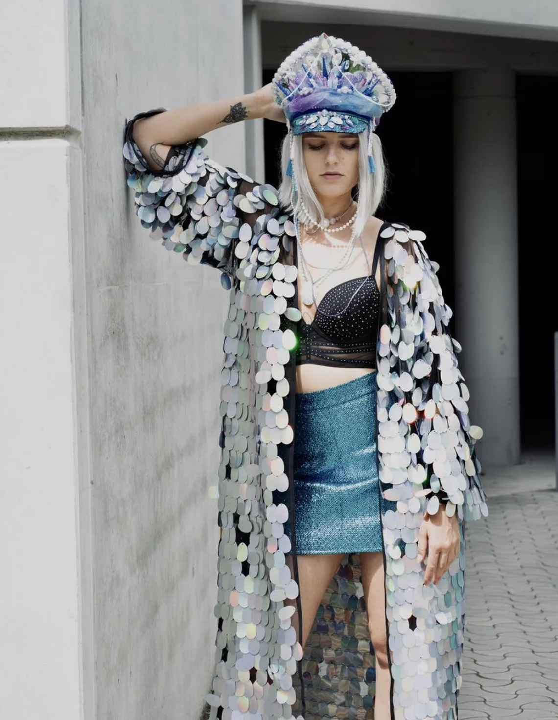 Iridescent Sequin Coat + Black Embellished Crop Top + Blue Metallic Mini Skirt + White Platform Sneakers