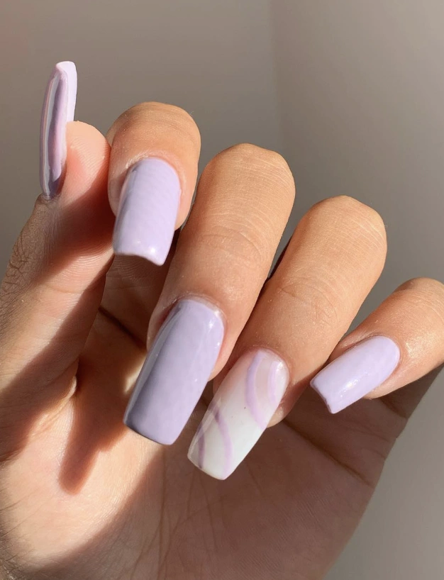 Lavender Nails Featuring Marble Swirls and Glossy Finish