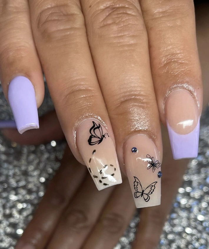 Lavender Nails with Design Featuring Elegant Butterfly Art