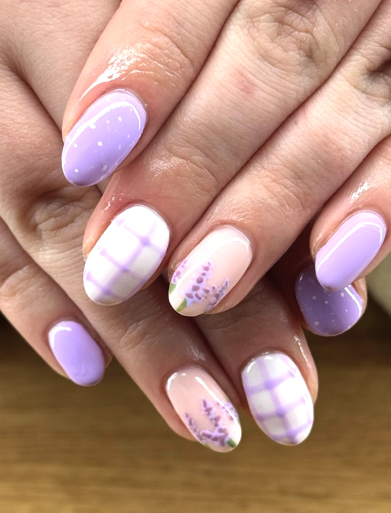 Lavender Nails with Flowers and Playful Pastel Patterns