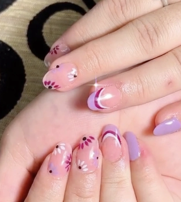 Lavender Short Nails with Floral Accents and Elegant Stripes