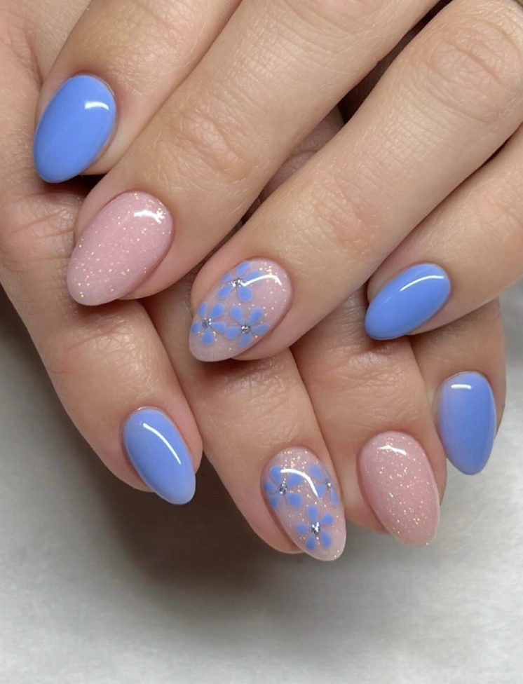 Light Blue and Glitter Almond Nails with Flower Detail
