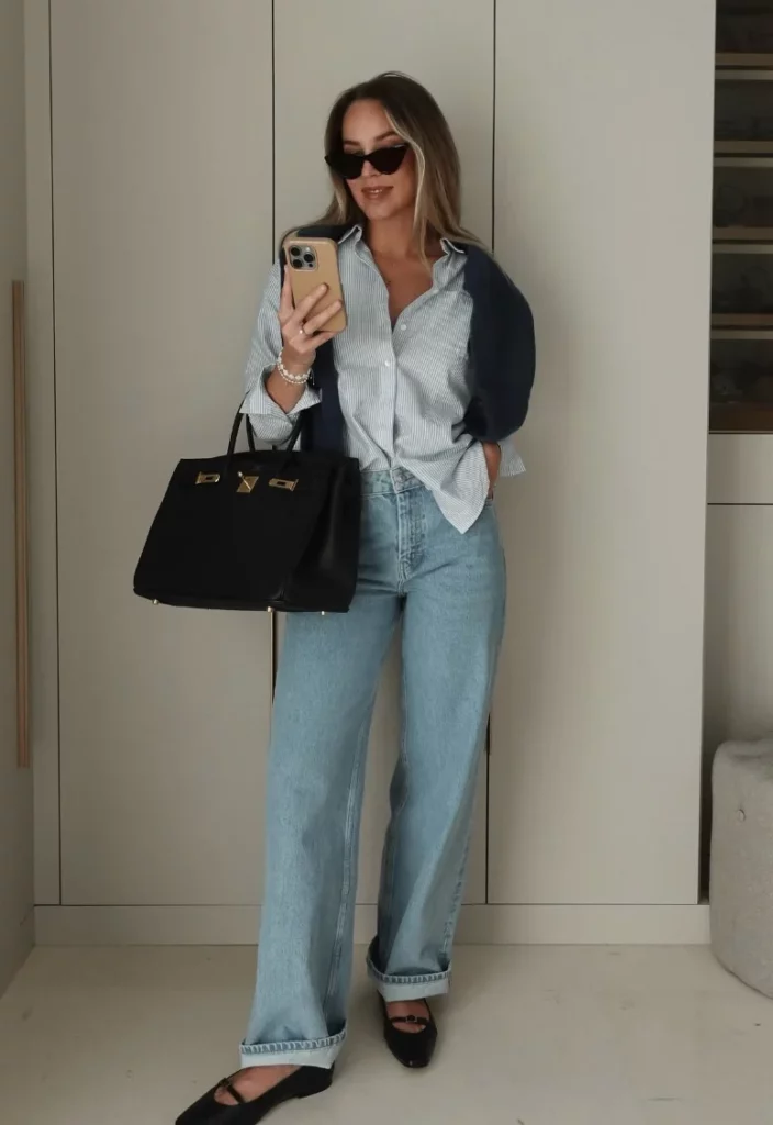 Light Blue Striped Button-Up Shirt + Light Wash Wide-Leg Jeans + Black Leather Loafers