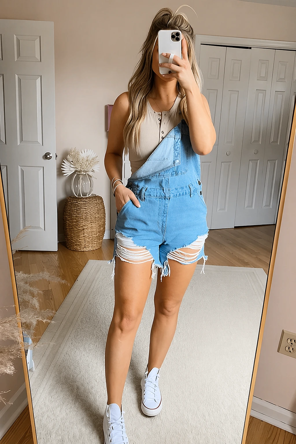 Light Wash Denim Overall Shorts + Beige Button-Up Tank Top + White Canvas Sneakers