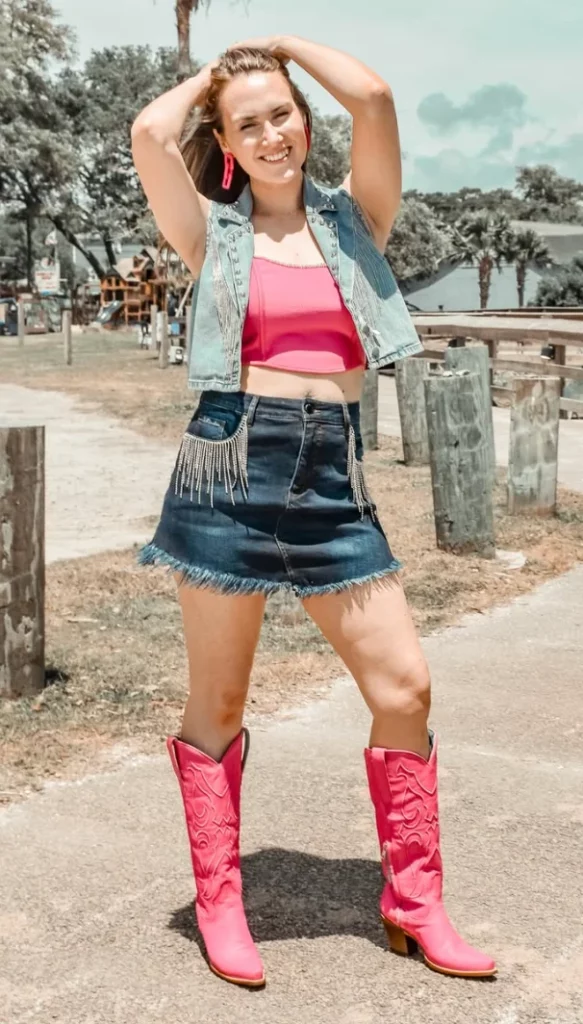 Light Wash Denim Vest + Hot Pink Crop Top + Dark Denim Mini Skirt With Fringe + Hot Pink Cowboy Boots