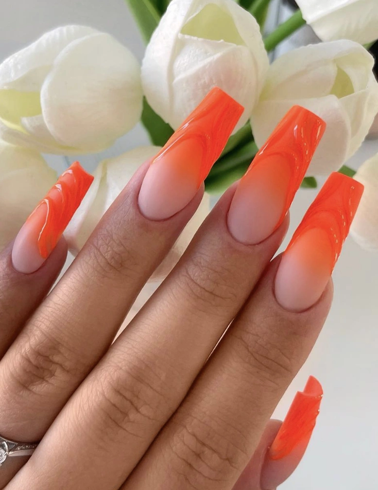 Long Coffin Nails with Orange Marble Swirl