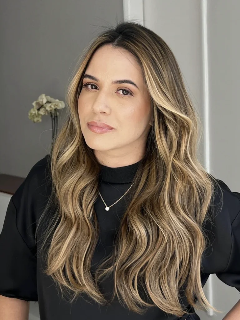 Long Layered Waves with Blonde Highlights