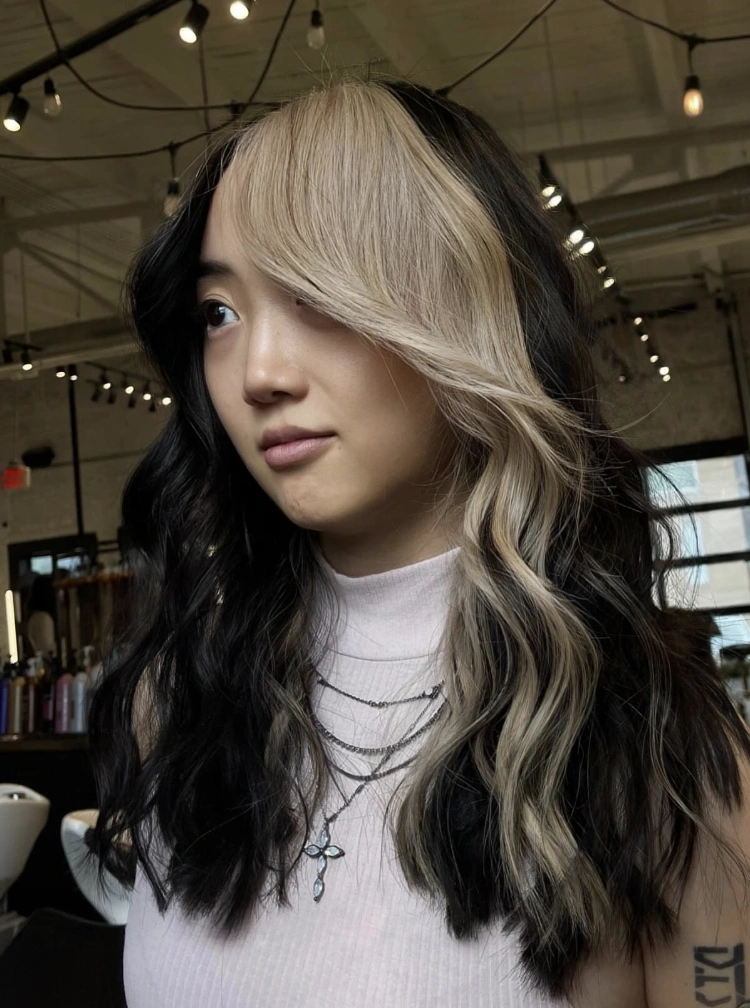 Long Wavy Hairstyle with Bold Highlights and Fall Brunette Hair Color