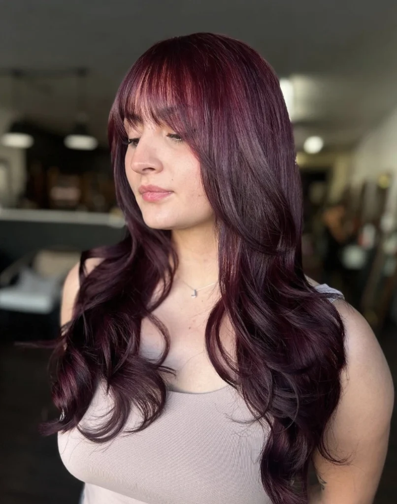 Luscious Long Waves with Soft Bangs in Deep Autumn Hair Color