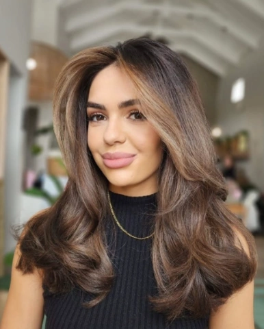 Luxurious Long Layered Waves with Subtle Highlights