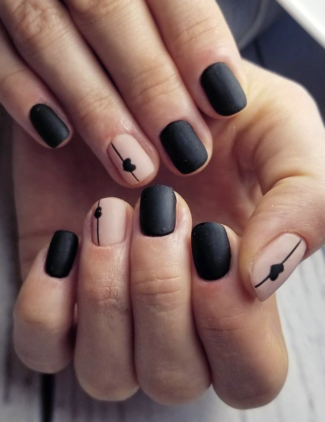 Matte Black & Nude Nails with Minimalist Heart Detail