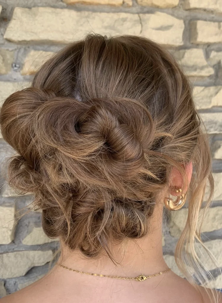 Messy Braided Bun with Face-Framing Pieces