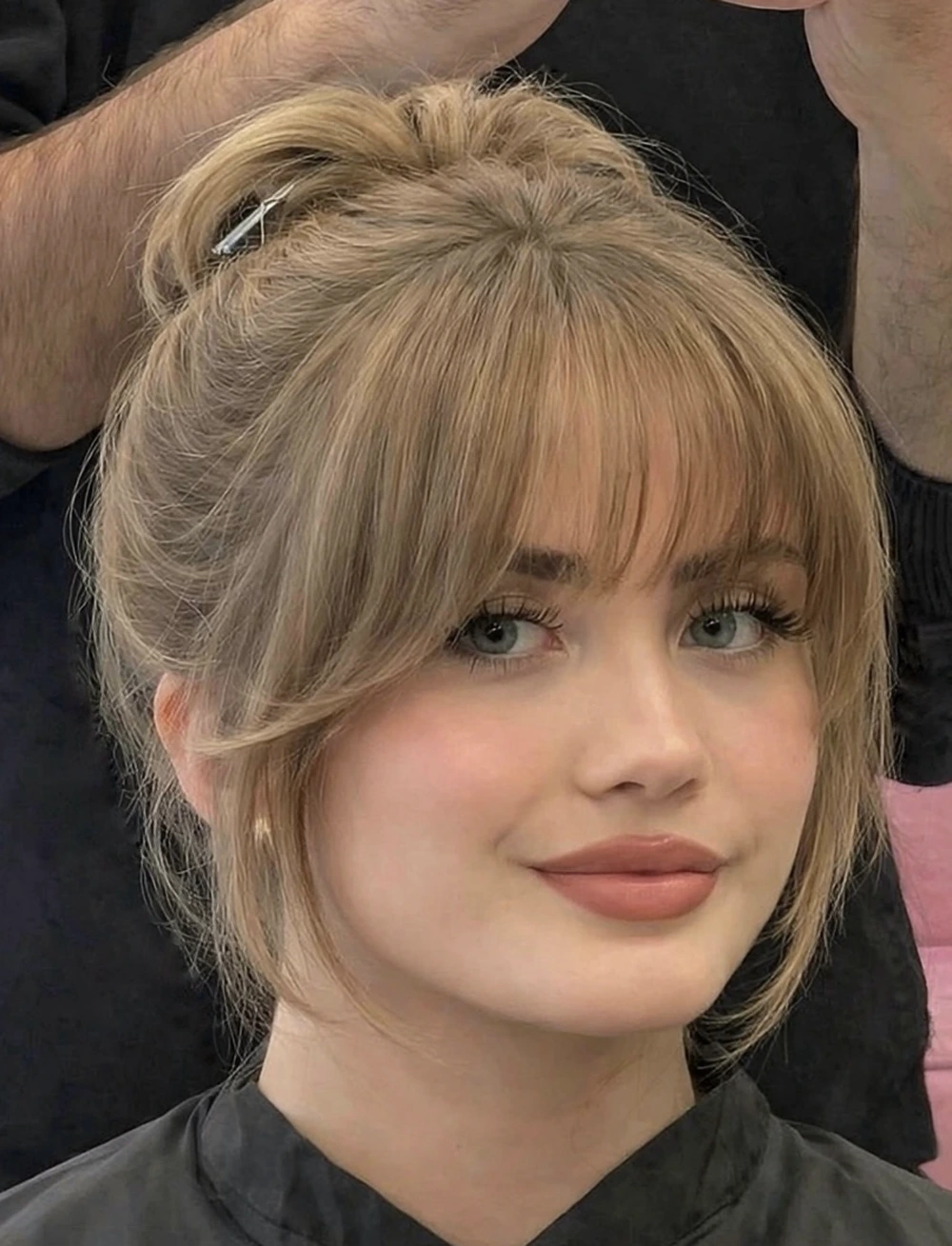 Messy Twisted Updo for Medium Hair with Curtain Bangs