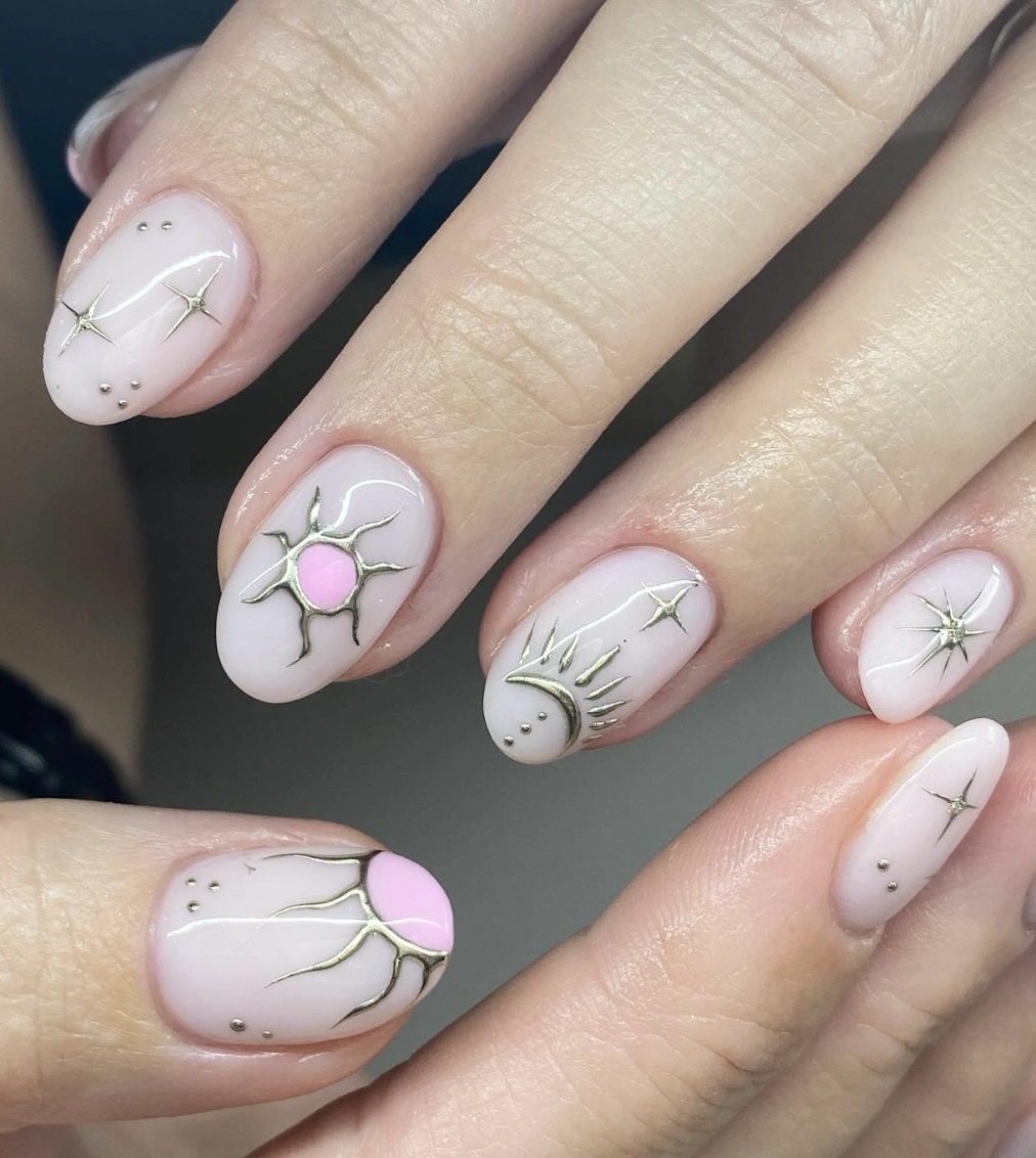 Milky Almond Nails with Celestial Gold Accents