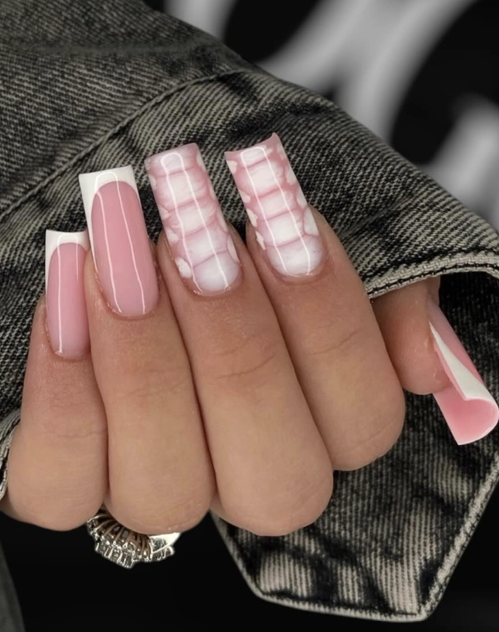 Milky White French Tip Nails with Soft Pink Base and Textured Accents